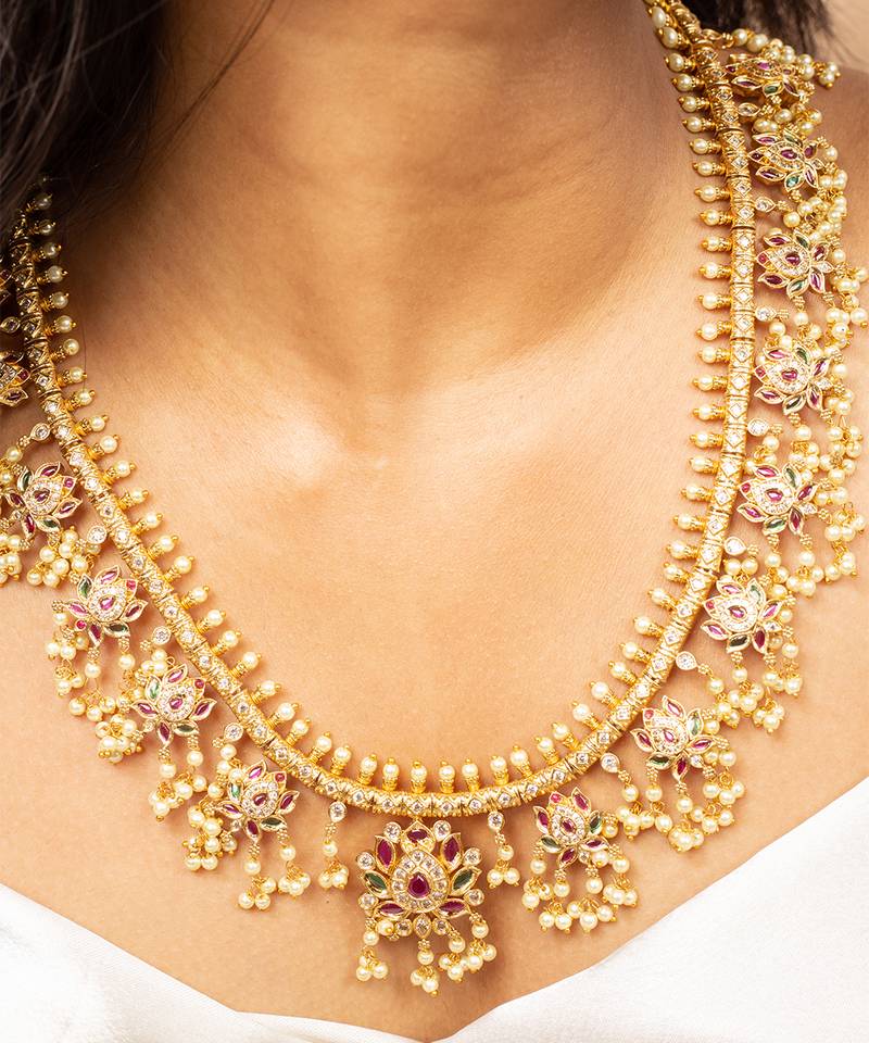 Guttapusalu long necklace with pink and white stones and matching stud earrings
