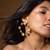 Two-tone floral earrings with crystal accents