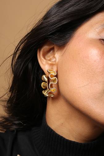 High gold textured hoop earrings with crystal accent