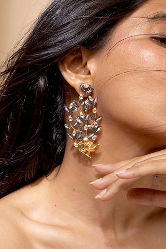 Two tone leaf and bird motif statement earrings