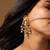 Two tone bird and pearl drop statement earrings