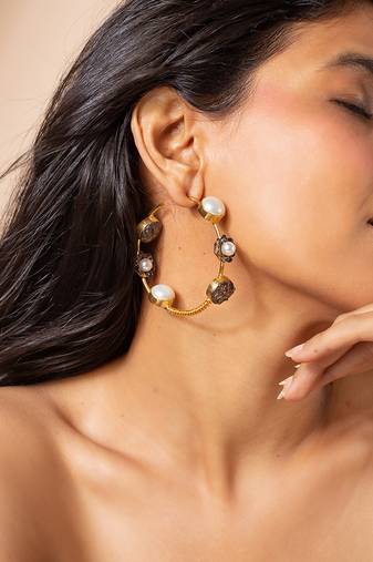 Two-tone pearl hoop earrings with floral accents