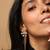 Floral dagger high gold earrings