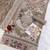 Beige embroidered sequence work heavy fox georgette unstitched suit borring with moti
