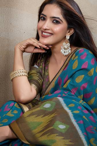 Turquoise woven cotton saree with blouse piece