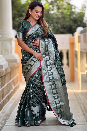 Green self design embellished silk blend saree with blouse