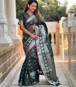 Green self design embellished silk blend saree  with blouse