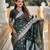 Green self design embellished silk blend saree with blouse