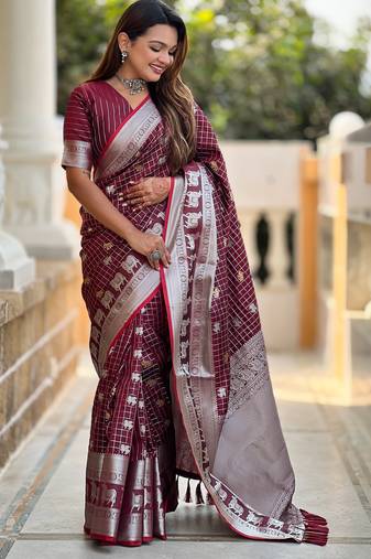 Maroon self design embellished silk blend saree with blouse