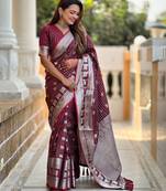 Maroon self design embellished silk blend saree  with blouse