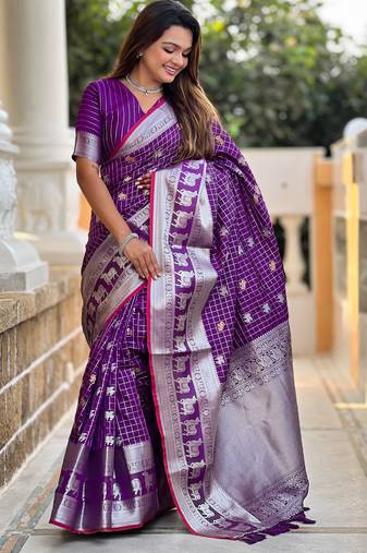 Purple self design embellished silk blend saree with blouse