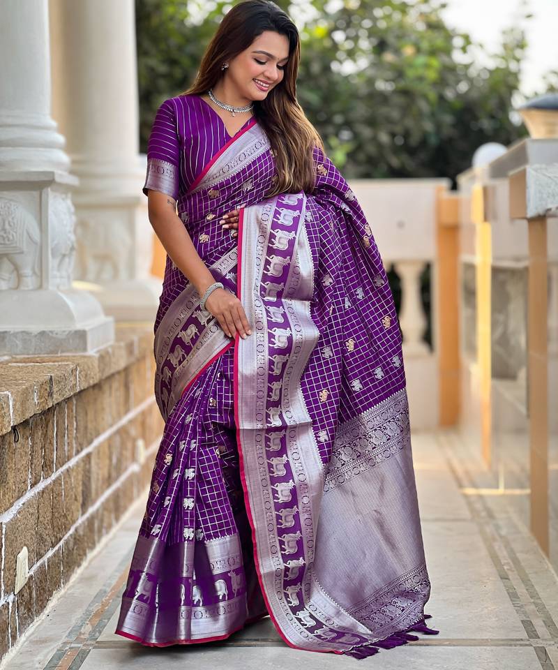 Purple self design embellished silk blend saree with blouse