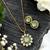 Elegant kundan green floral pendant set with earrings traditional gold finish jewelry by treemoda