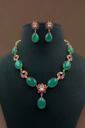 Regal emerald & ruby stone necklace set with floral accents by treemoda