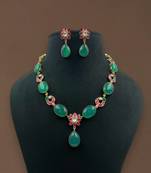Regal emerald & ruby stone necklace set with floral accents by treemoda