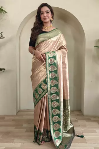 Cream self design embellished silk blend saree with blouse