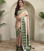 Cream self design embellished silk blend saree  with blouse