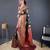 Blood red self design embellished silk blend saree with blouse 