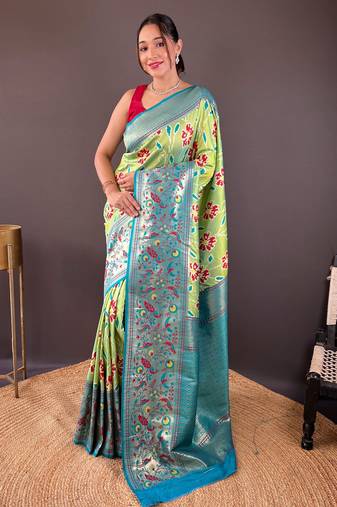 Green self design embellished silk blend saree with blouse 