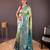Green self design embellished silk blend saree with blouse 