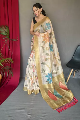 Cream embellished self design silk blend saree with blouse