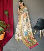 Cream embellished self design silk blend saree with blouse
