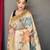 Cream embellished self design silk blend saree with blouse