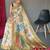 Cream embellished self design silk blend saree with blouse