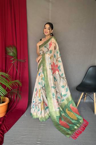 Green embellished self design silk blend saree with blouse