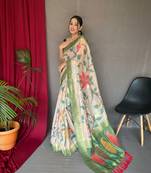 Green embellished self design silk blend saree  with blouse