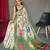 Green embellished self design silk blend saree with blouse