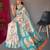 Green embellished self design silk blend saree with blouse