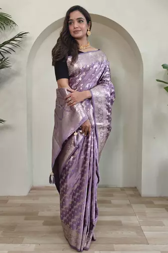 Lavender embellished self design silk blend saree with blouse  