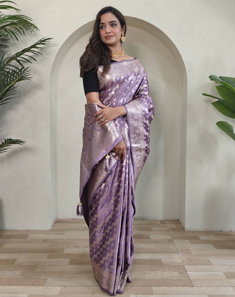 Lavender embellished self design silk blend saree with blouse  