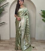 Green embellished self design silk blend saree  with blouse    