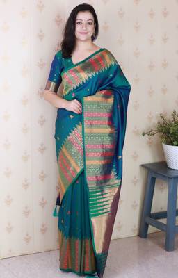 Soft silk meenakari zari woven saree with temple border. 1