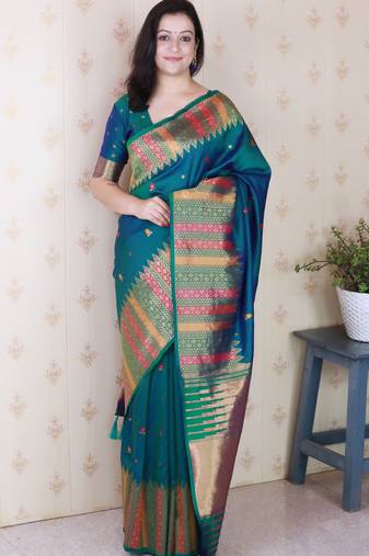 Soft silk meenakari zari woven saree with temple border.