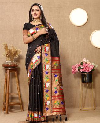 Soft pethani silk saree with zari weawing  motifs design and meenakari  weawing rich pallu. 1