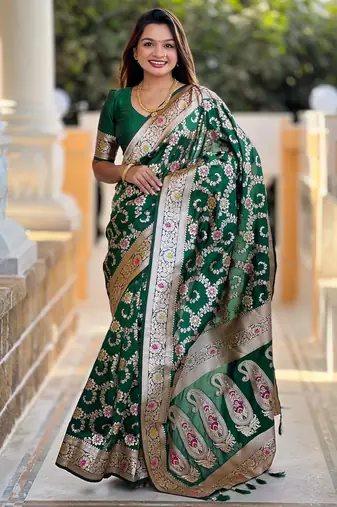 Soft banarasi silk saree with zari weaving meenakari touchup design all over the saree.