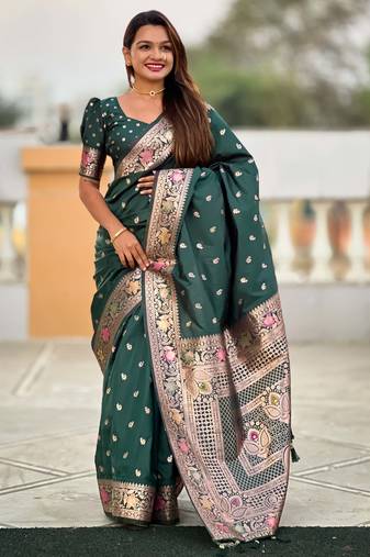 Soft banarasi silk saree with zari weaving meenakari touchup design all over the saree.