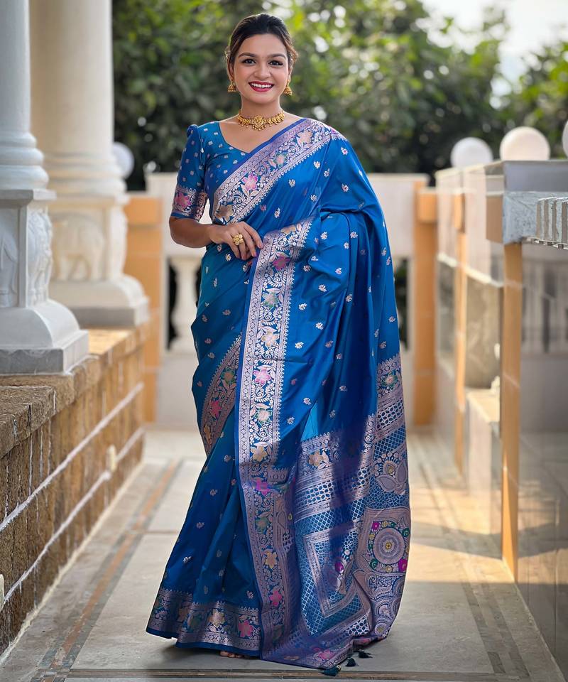 Soft banarasi silk saree with zari weaving meenakari touchup design all over the saree.