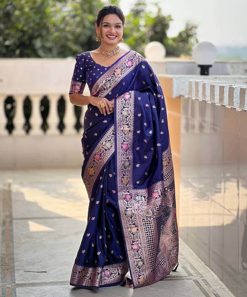 Soft banarasi silk saree with zari weaving meenakari touchup design all over the saree.