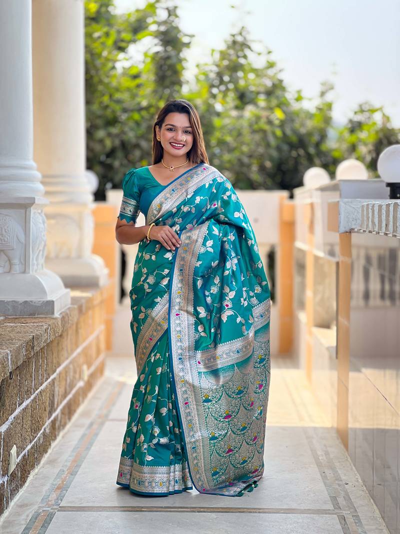 Soft banarasi silk saree with zari weaving meenakari touchup design all over the saree.