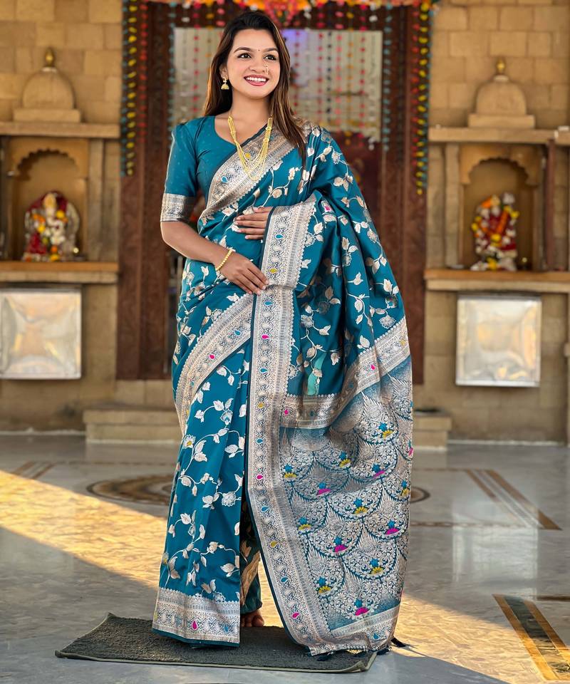 Soft banarasi silk saree with zari weaving meenakari touchup design all over the saree.