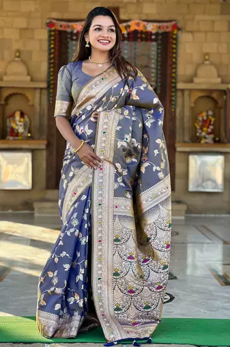 Soft banarasi silk saree with zari weaving meenakari touchup design all over the saree.