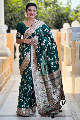 Soft banarasi silk saree with zari weaving meenakari touchup design all over the saree.