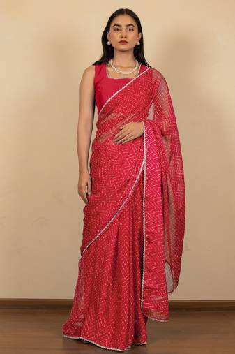 Women's red chevron print golden lace border chiffon saree with unstiched blouse piece