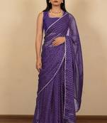 Women's purple chevron print golden lace border chiffon saree with unstiched blouse piece