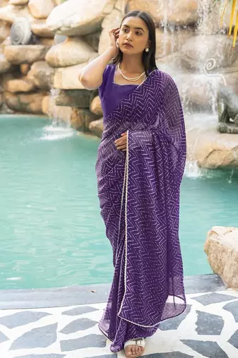 Women's purple chevron print golden lace border chiffon saree with unstiched blouse piece