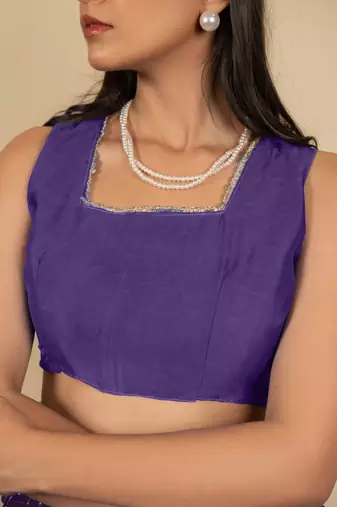 Women's purple chevron print golden lace border chiffon saree with unstiched blouse piece
